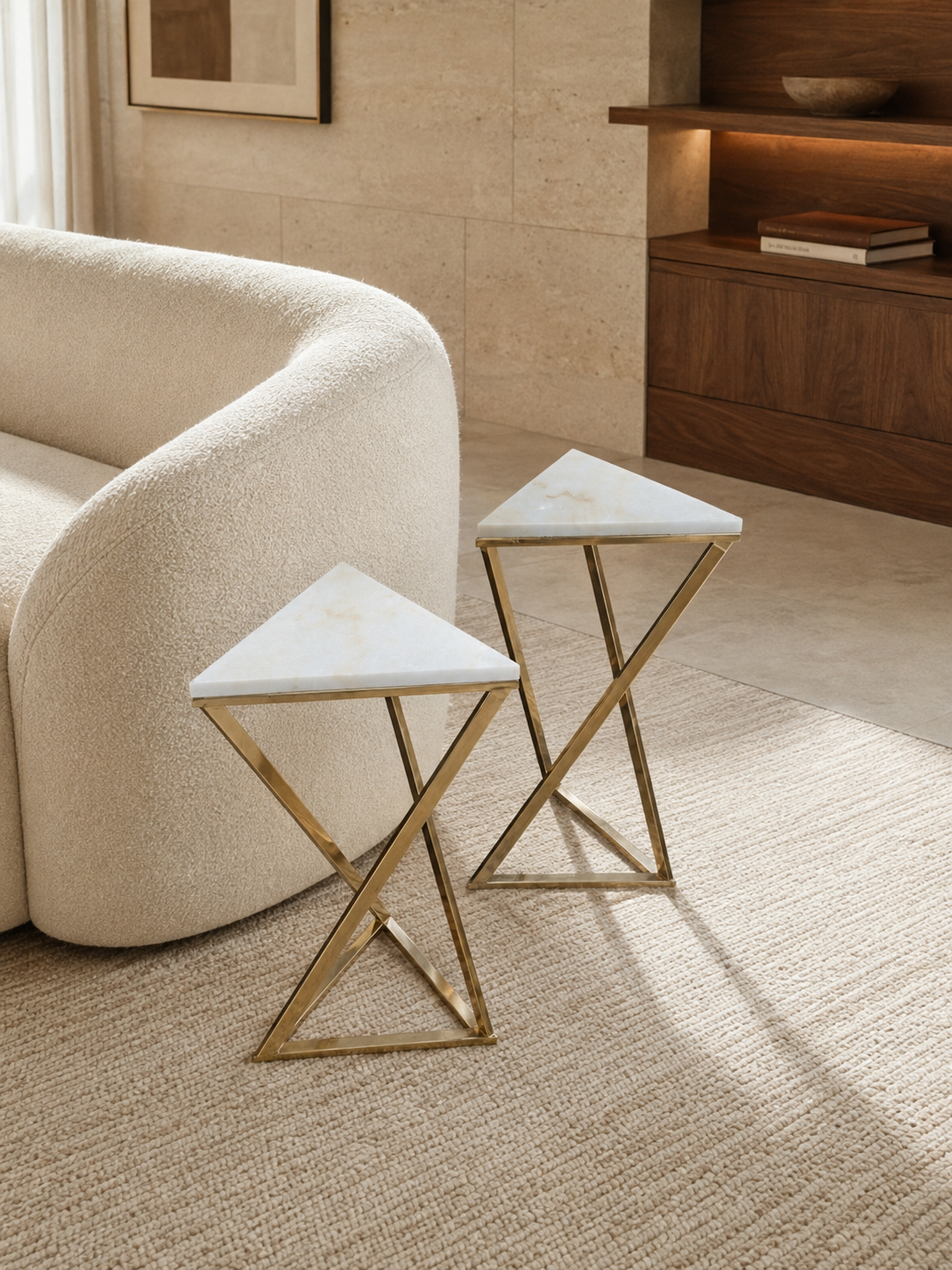 Trinity white onyx nesting corner tables set of two with triangular tops and PVD gold X-frames